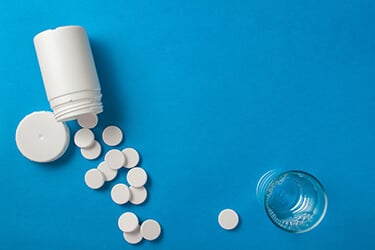 Aspirin bottle that enhances the function of stem cells found inside teeth.